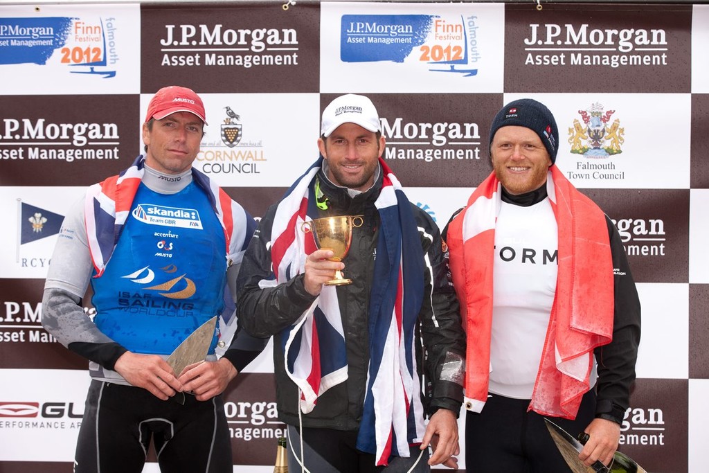 Ben Ainslie (1st) Ed Wright (2nd) and Jonas Hoegh-Christensen (3rd) celebrate on the podium of J.P. Morgan Asset Management Finn World Championship 2012 podium &copy; Lloyd Images http://lloydimagesgallery.photoshelter.com/